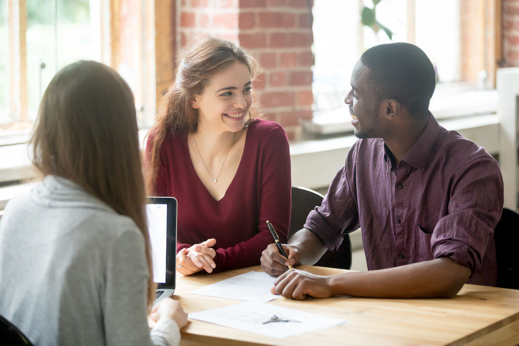 Couple signing apartment lease